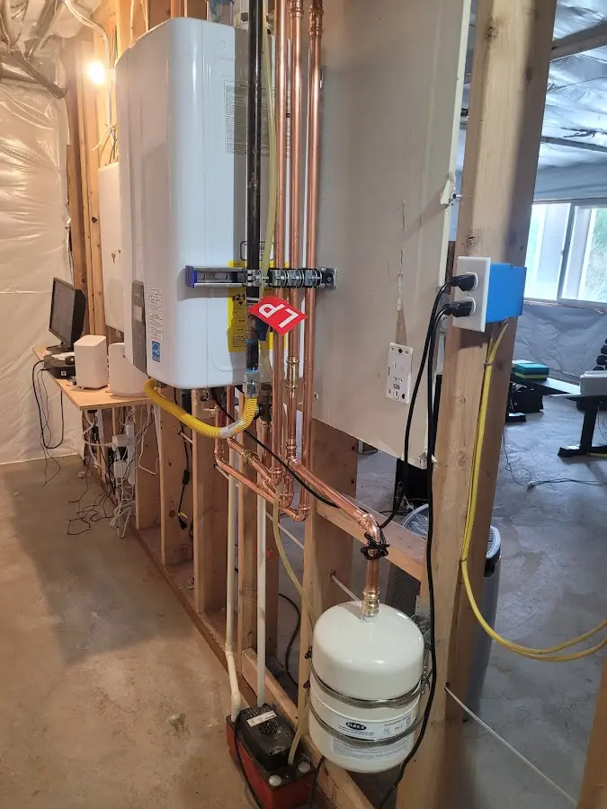 Licensed plumber repairing a kitchen sink in Antwerp